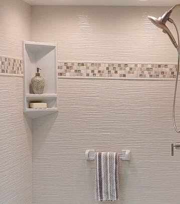 Onyx wavy tile finish with recessed tile trim